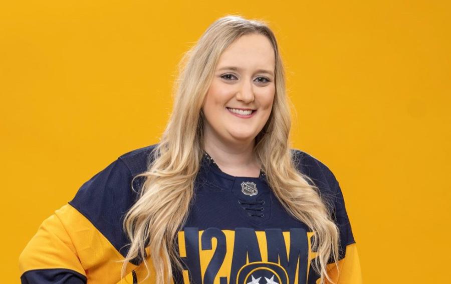 Britney Hitch headshot in Nashville Predators Jersey