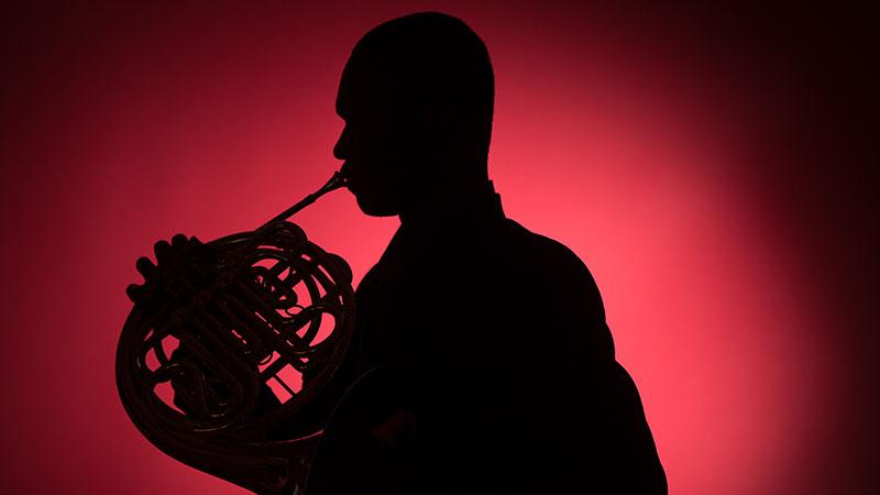 Emmanuel Méjeun poses with French Horn